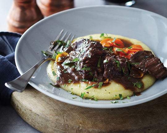Beef Cheeks braised in a rich Stout with creamy mashed potatoes