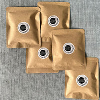 A pack of 5 'specialty coffee' 12-gram drip bags (by Dr. Sutton's Coffee)