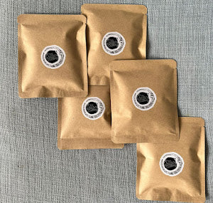 A pack of 5 'specialty coffee' 12-gram drip bags (by Dr. Sutton's Coffee)